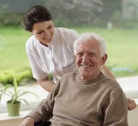 elderly man and carer